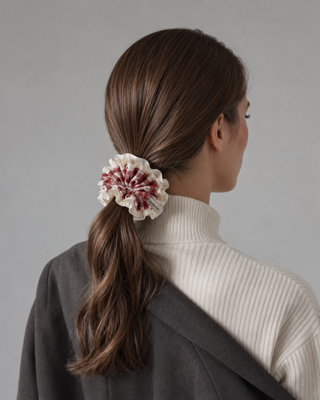 BetterHalo scrunchie securely worn around a low ponytail